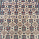 1970s pale red vintage turkish rug with traditional design, hand-knotted weave and low pile.