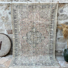 Pink 5' x 8' vintage turkish rug with medallion design, handmade in Turkey – Mel.
