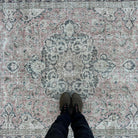 1970s pink vintage turkish rug with medallion design, hand-knotted weave and low pile.