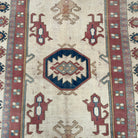 1970s pink vintage turkish rug with traditional design, hand-knotted weave and low pile.