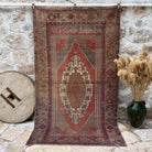 Red 5' x 8' vintage turkish rug with traditional design, handmade in Turkey – Eunice.