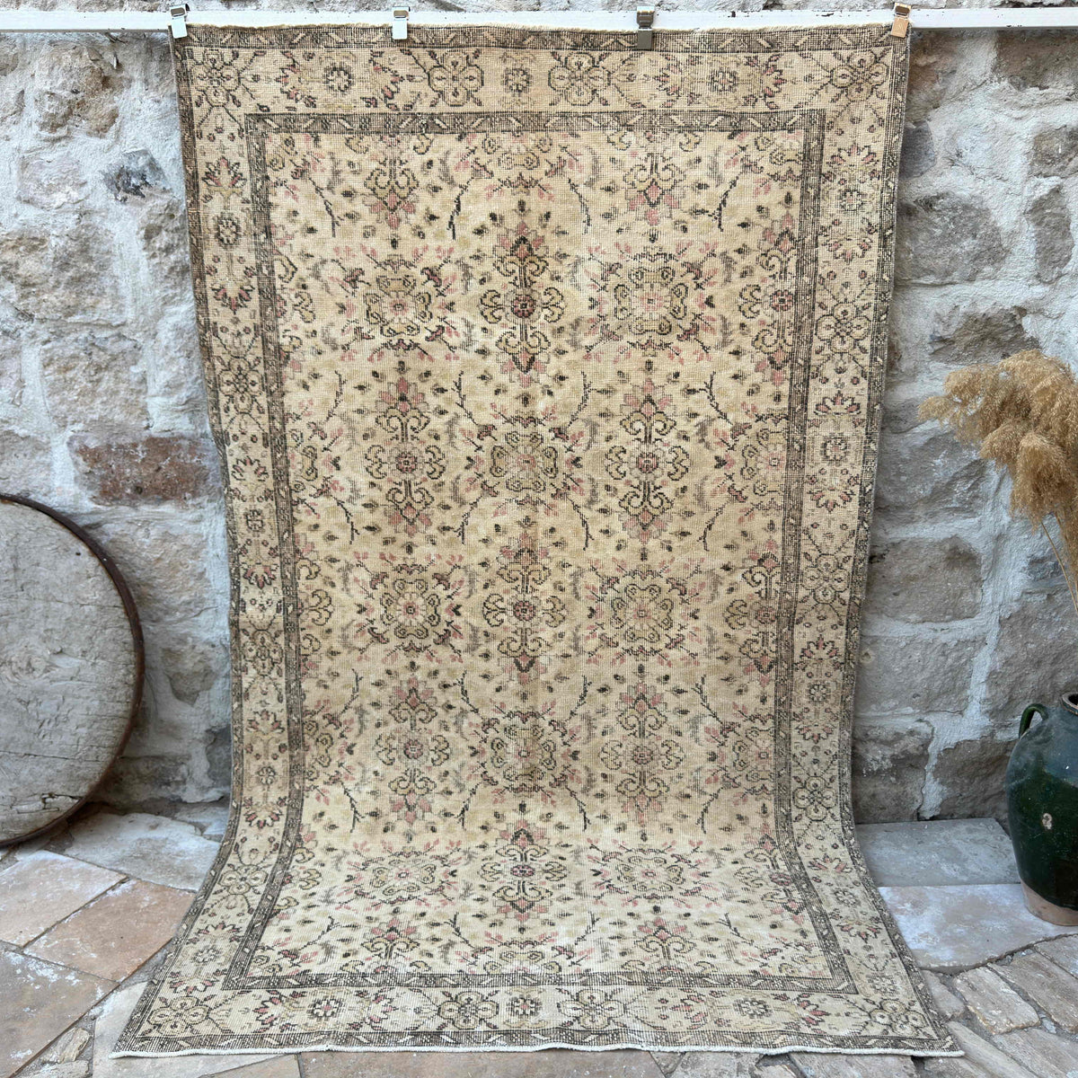 Brown 5' x 9' vintage turkish rug with floral design, handmade in Turkey – Hannah.