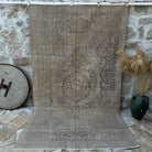 Beige 6' x 10' vintage turkish rug with neutral design, handmade in Turkey – Esteban.