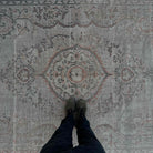 1970s beige vintage turkish rug with neutral design, hand-knotted weave and low pile.
