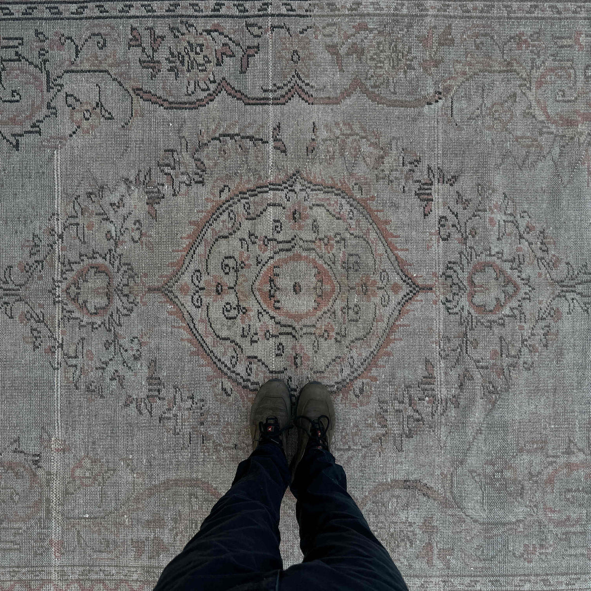 1970s beige vintage turkish rug with neutral design, hand-knotted weave and low pile.