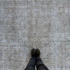 1970s beige vintage turkish rug with floral design, hand-knotted weave and low pile.