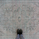 1970s beige vintage turkish rug with medallion design, hand-knotted weave and low pile.