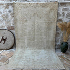Beige 6' x 10' vintage turkish rug with neutral design, handmade in Turkey – Vernon.