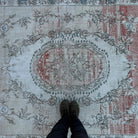 1970s beige vintage turkish rug with medallion design, hand-knotted weave and low pile.