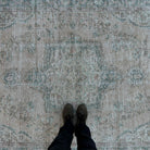 1970s blue vintage turkish rug with medallion design, hand-knotted weave and low pile.