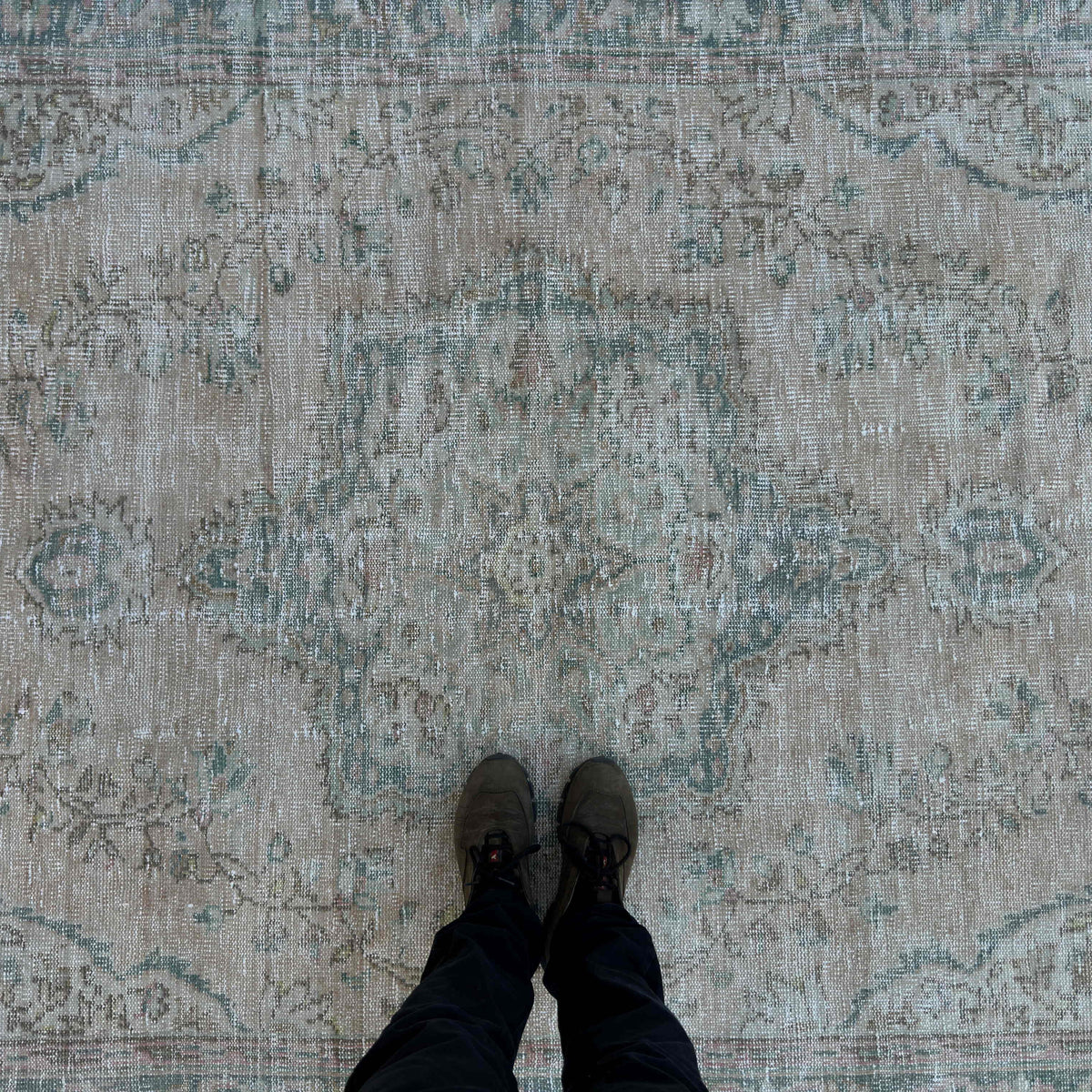 1970s blue vintage turkish rug with medallion design, hand-knotted weave and low pile.