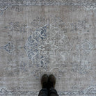 1970s blue vintage turkish rug with medallion design, hand-knotted weave and low pile.