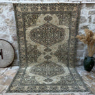Brown 6' x 10' vintage turkish rug with traditional design, handmade in Turkey – Elio.