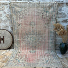 Pink 6' x 10' vintage turkish rug with medallion design, handmade in Turkey – Blaise.