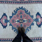 1970s pink vintage turkish rug with medallion design, hand-knotted weave and low pile.