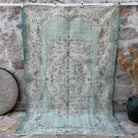 Blue 6' x 8' vintage turkish rug with medallion design, handmade in Turkey – Damir.