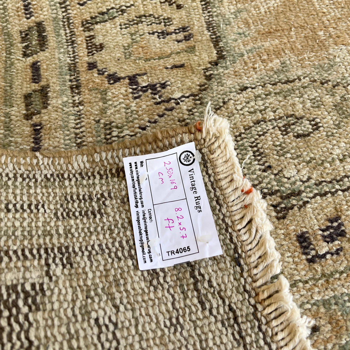 1970s blue vintage turkish rug with medallion design, hand-knotted weave and low pile.
