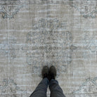 1970s beige vintage turkish rug with neutral design, hand-knotted weave and low pile.