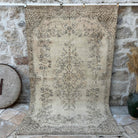 Beige 6' x 9' vintage turkish rug with neutral design, handmade in Turkey – Rupert.