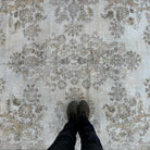 1970s beige vintage turkish rug with traditional design, hand-knotted weave and low pile.