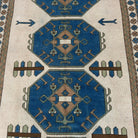1970s blue vintage turkish rug with traditional design, hand-knotted weave and low pile.