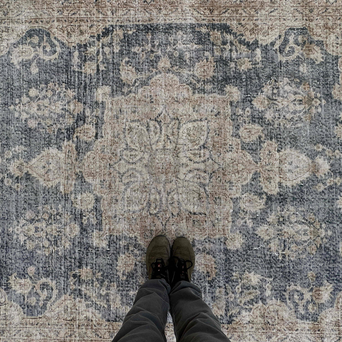 1970s blue vintage turkish rug with medallion design, hand-knotted weave and low pile.