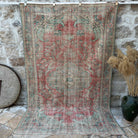Red 6' x 9' vintage turkish rug with medallion design, handmade in Turkey – Eleri.