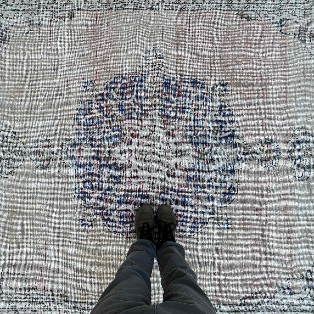 1970s beige vintage turkish rug with medallion design, hand-knotted weave and low pile.