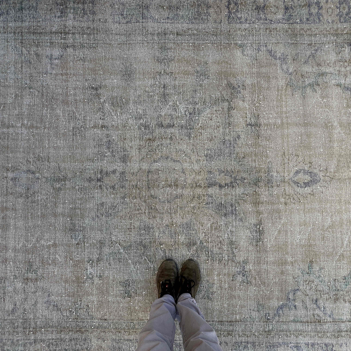 1970s beige vintage turkish rug with neutral design, hand-knotted weave and low pile.