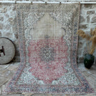 Beige 7' x 11' vintage turkish rug with medallion design, handmade in Turkey – Jair.