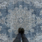 1970s beige vintage turkish rug with neutral and medallion design, hand-knotted weave and low pile.