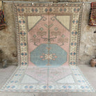 Pink 7' x 11' vintage turkish rug with medallion design, handmade in Turkey – Dyson.
