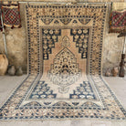 Blue 7' x 13' vintage turkish rug with traditional design, handmade in Turkey – London.