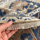 1970s blue vintage turkish rug with traditional design, hand-knotted weave and low pile.