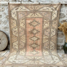 Beige 7' x 9' vintage turkish rug with neutral design, handmade in Turkey – Mathias.