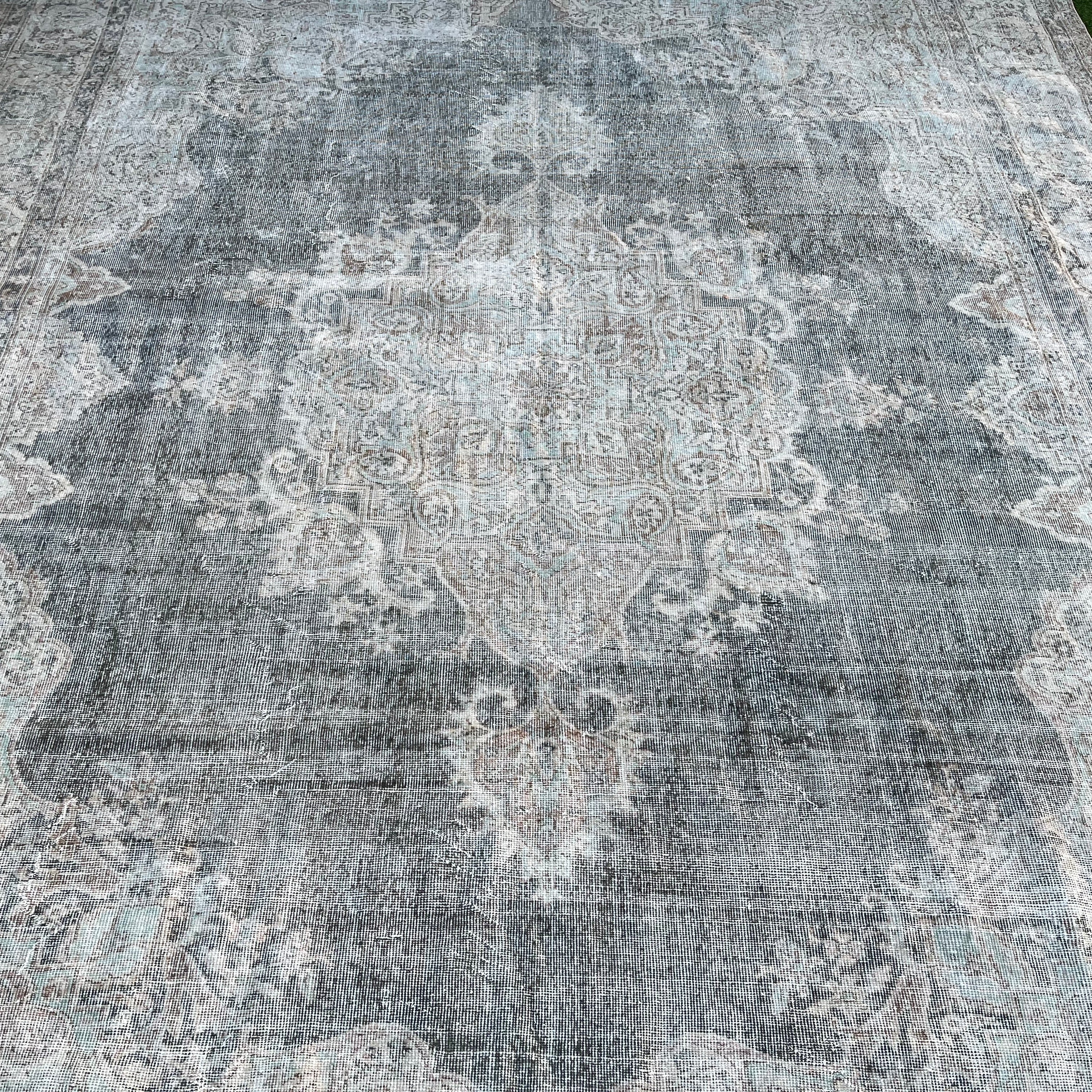 1970s beige vintage turkish rug with neutral and medallion design, hand-knotted weave and low pile.