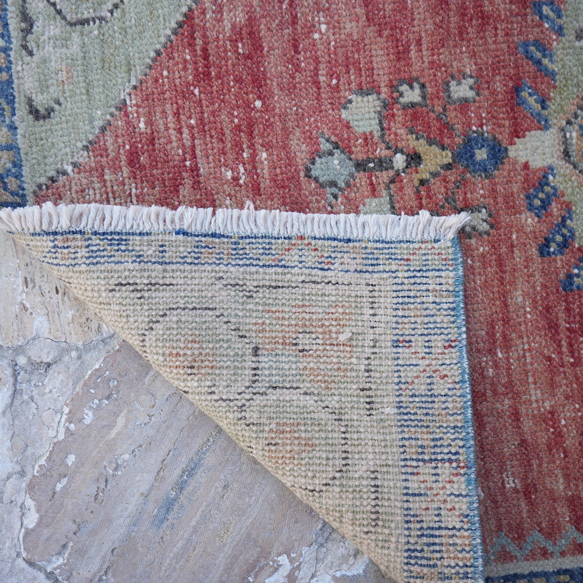 1970s red vintage turkish rug, hand-knotted weave and low pile.