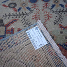 Red 2' x 5' vintage turkish rug from the 1970s.
