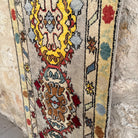 1970s gray vintage turkish runner rug with oushak design, hand-knotted weave and low pile.