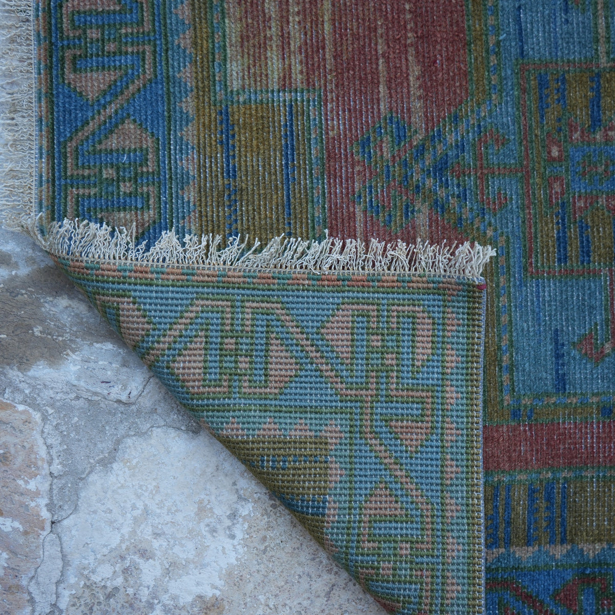1970s blue vintage turkish runner rug with traditional design, hand-knotted weave and low pile.
