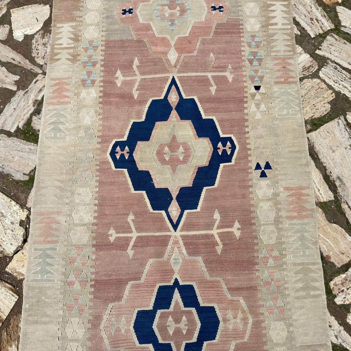 1970s brown vintage turkish runner rug with medallion design, hand-knotted weave and low pile.