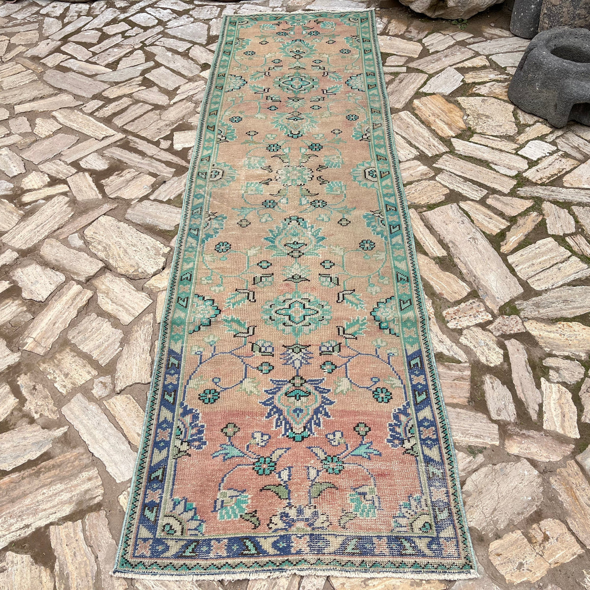 Pale Green 3' x 11' vintage turkish runner rug in wool and cotton, shown on the floor.