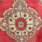 Red 3' x 11' vintage turkish runner rug in wool and cotton, shown on the floor.