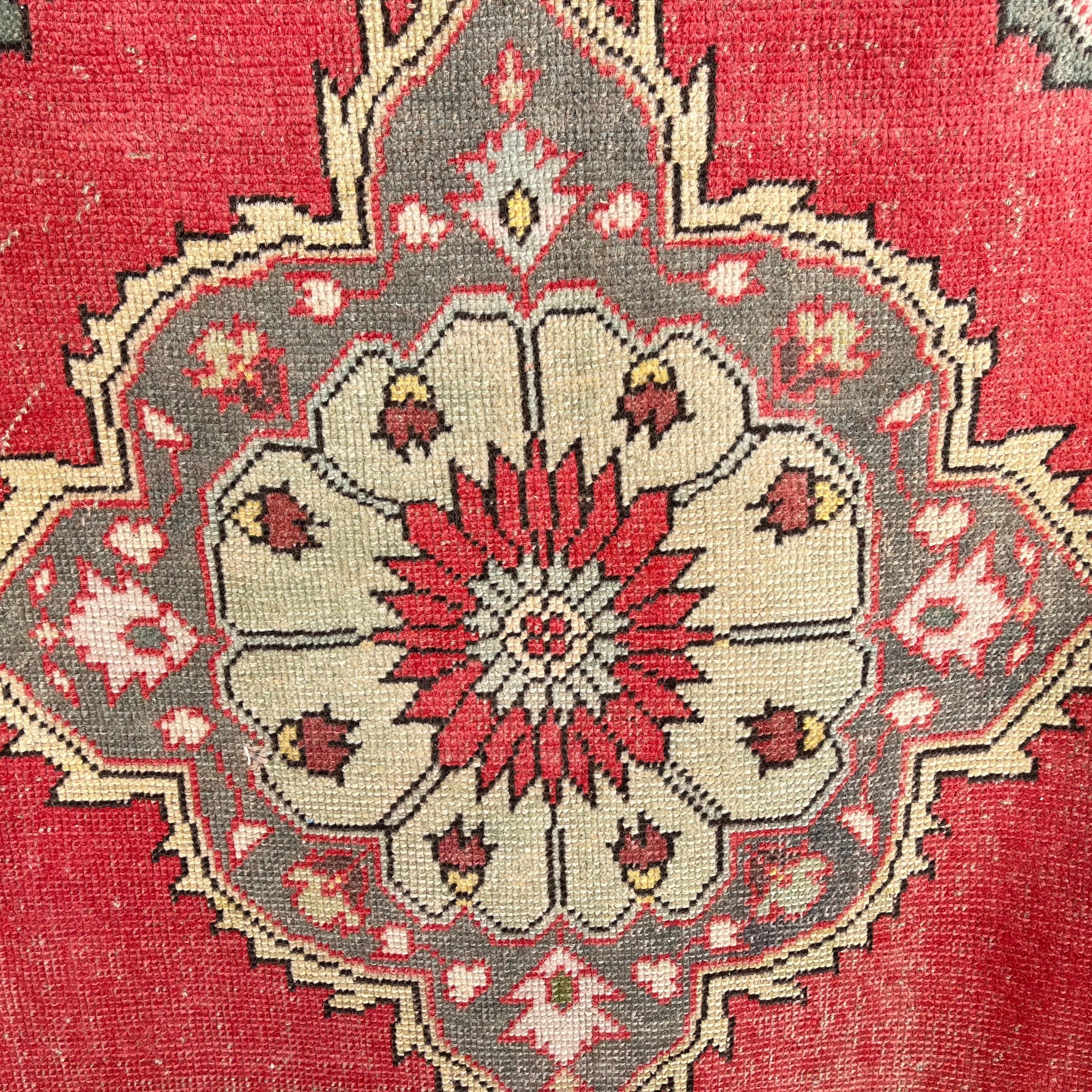 Red 3' x 11' vintage turkish runner rug in wool and cotton, shown on the floor.