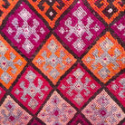 Pink 3' x 12' vintage turkish runner rug in wool and cotton, shown on the floor.