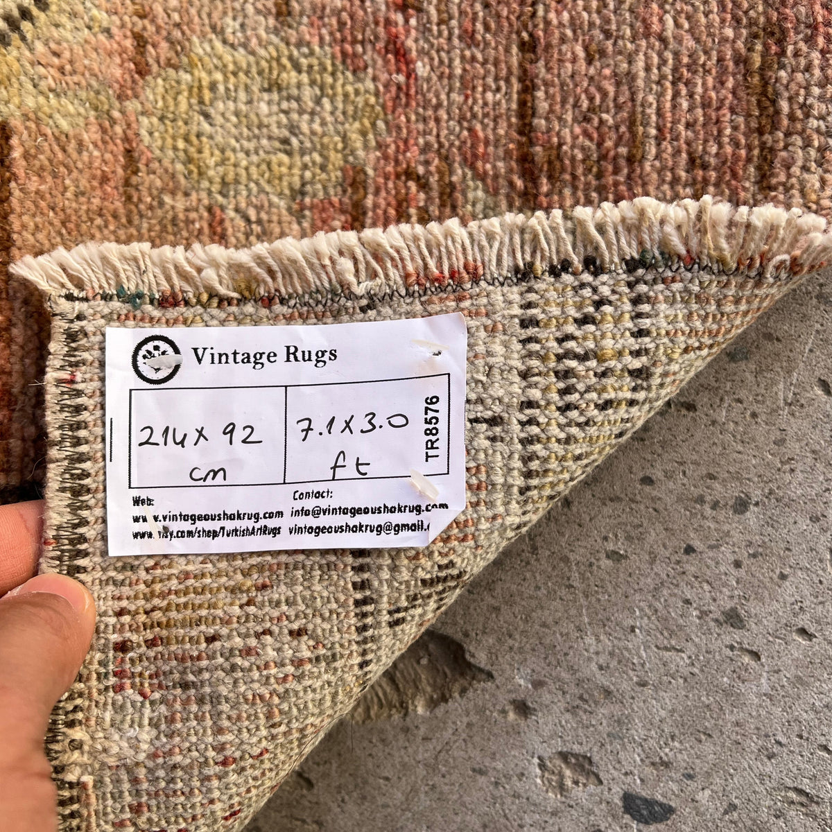 Red 3' x 7' vintage turkish runner rug in wool and cotton, shown on the floor.