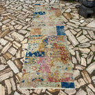 Blue 3' x 9' vintage turkish runner rug in wool and cotton, shown on the floor.