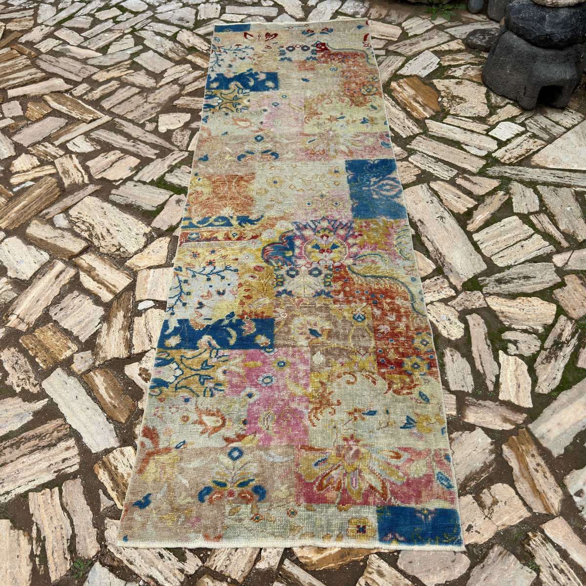 Blue 3' x 9' vintage turkish runner rug in wool and cotton, shown on the floor.