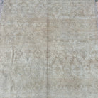 1970s brown vintage turkish runner rug with neutral design, hand-knotted weave and low pile.