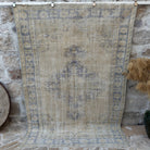 Blue 6' x 8' vintage wool distressed rug with medallion design, handmade in Turkey – Teri.
